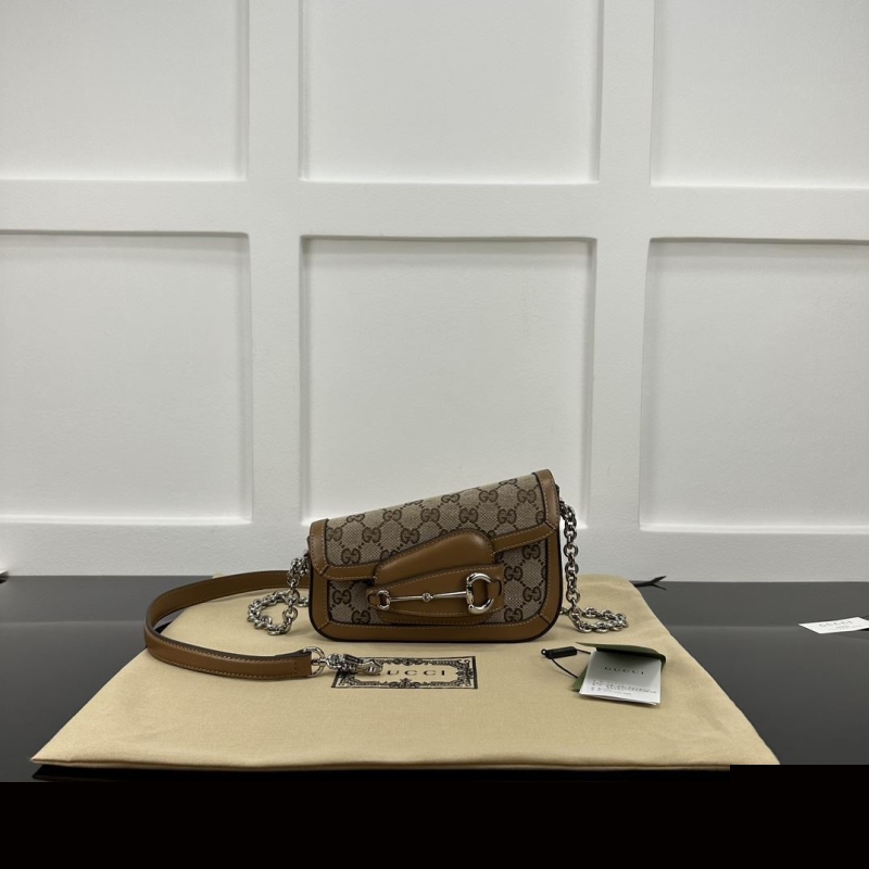 G*u*i top handle bags